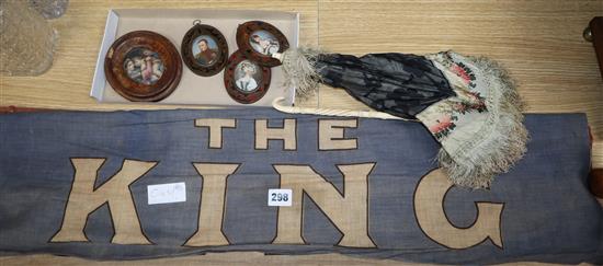 An ivory handled parasol flag: God Save The King and four oval miniatures